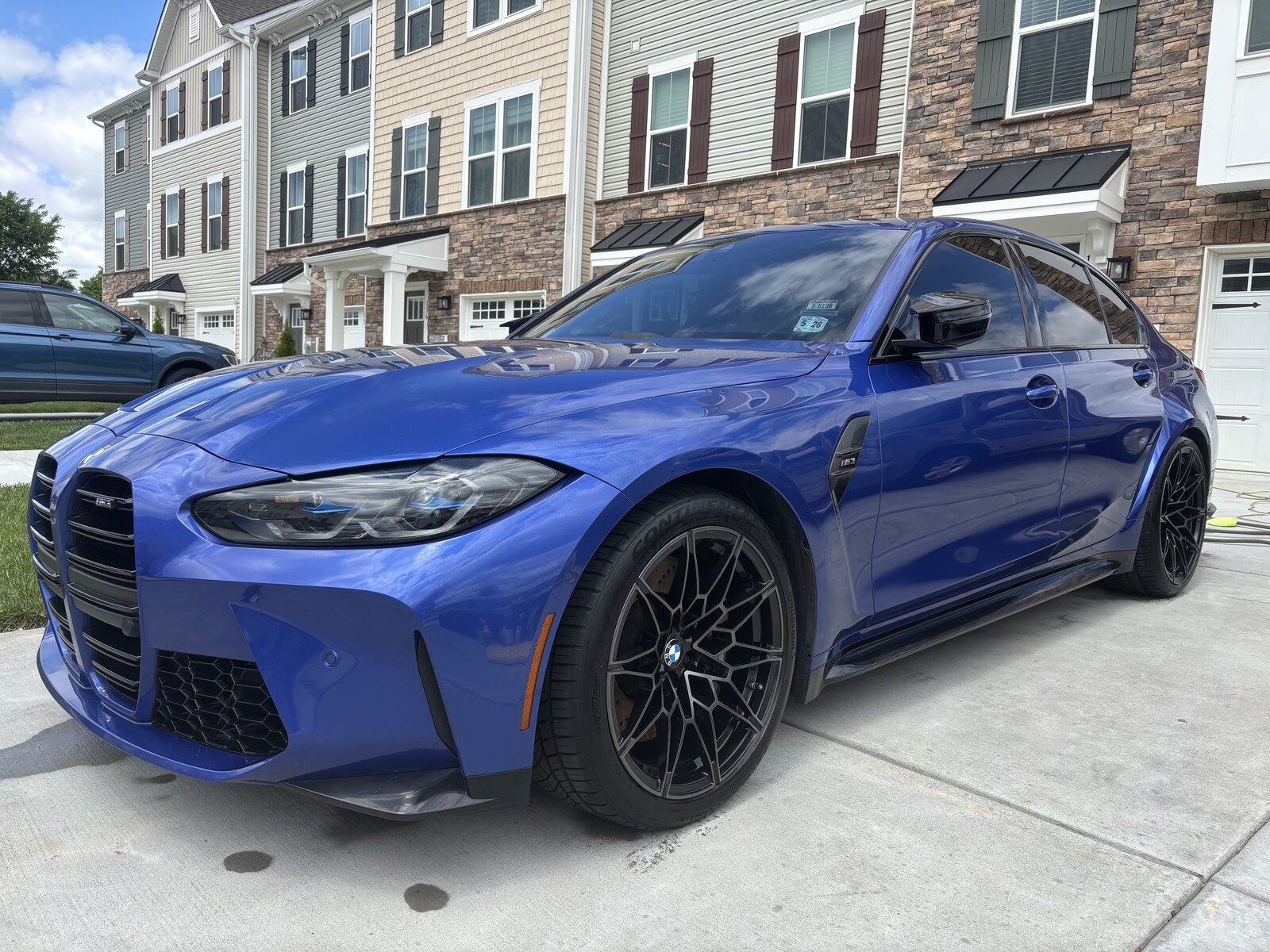 Ceramic coating gloss on black sedan — South Jersey mobile detailing